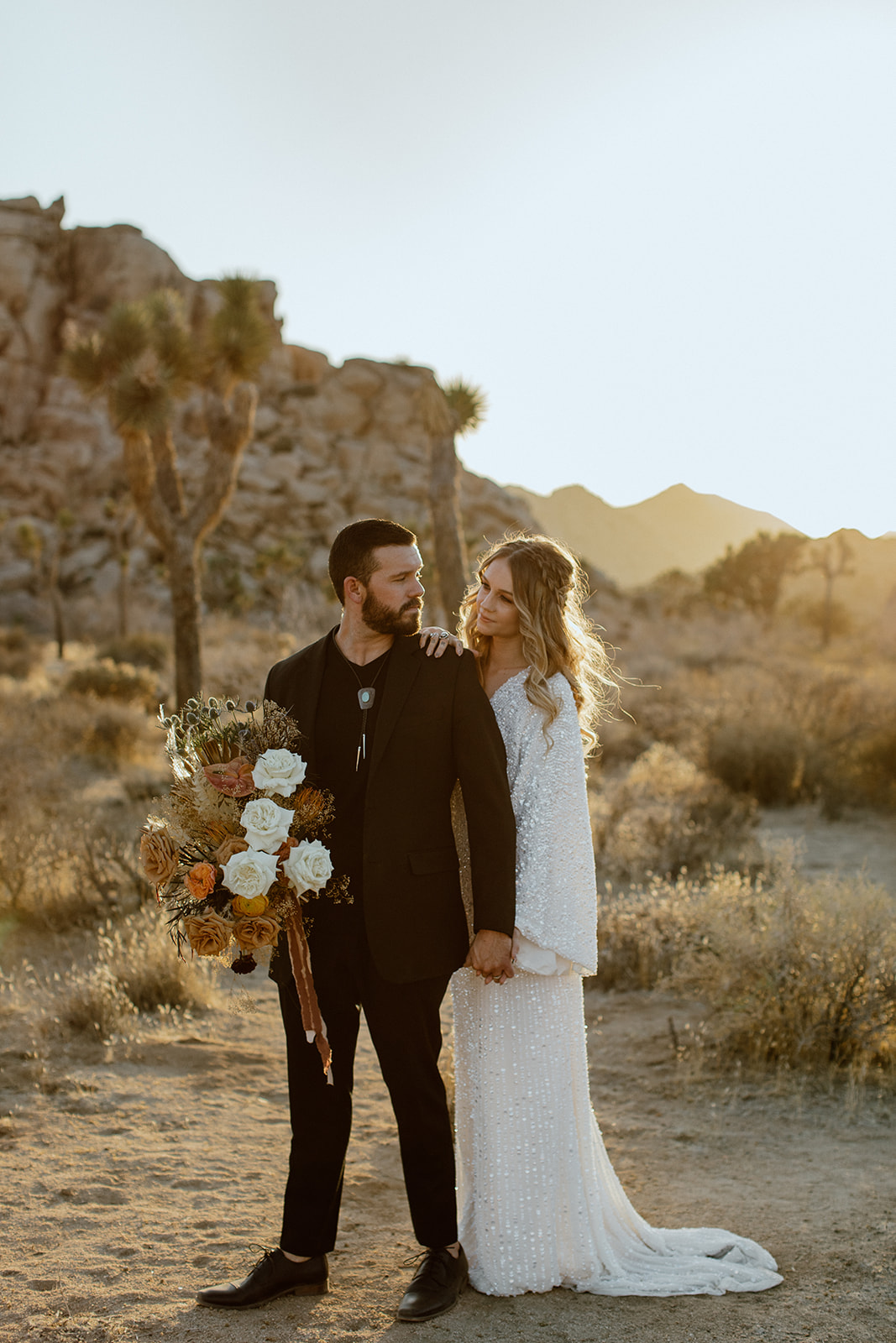 Looking for elopement inspiration? Joshua Tree National Park is the perfect destination for a bohemian desert themed elopement by Emily Battles